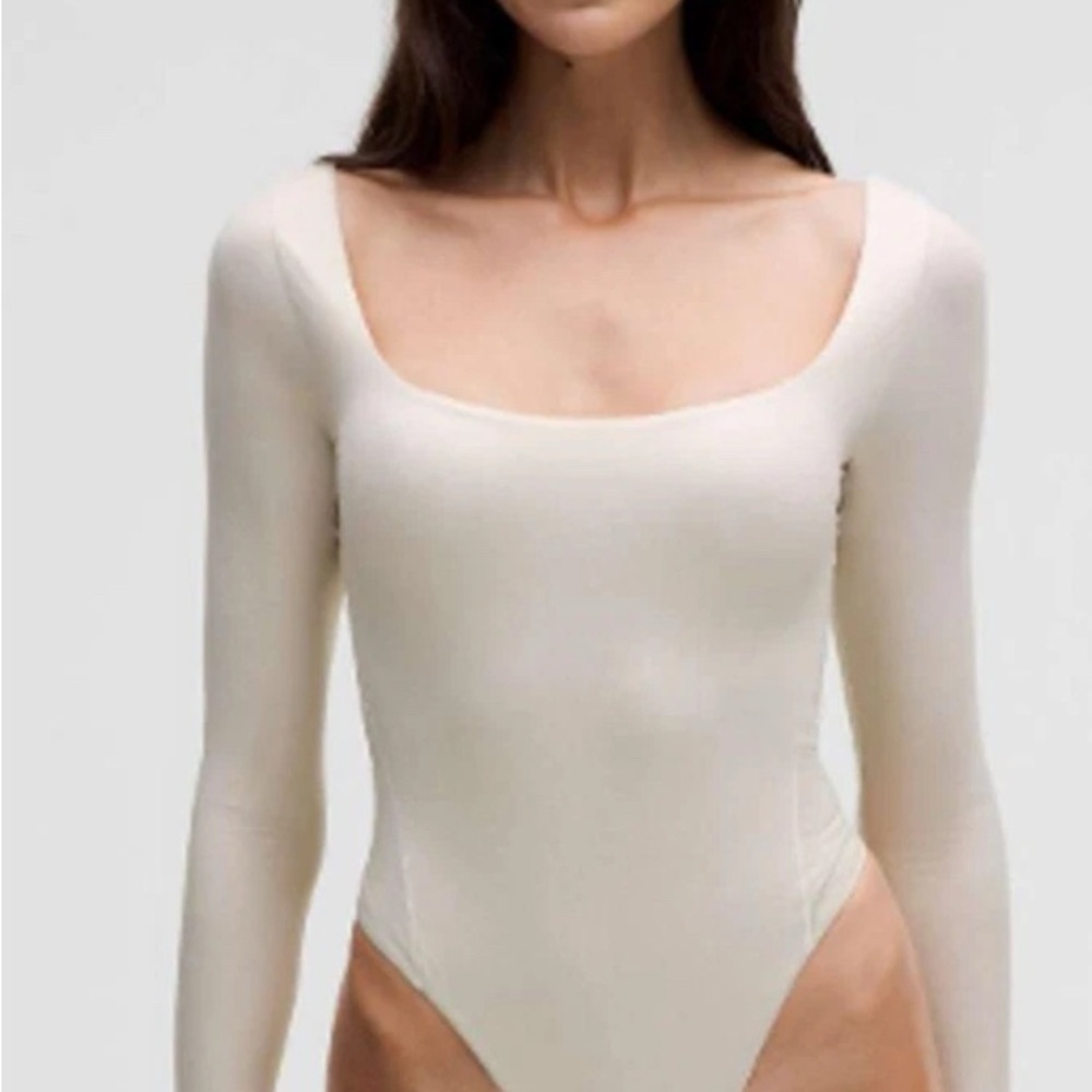 Lululemon Women’s Shine Cream Long Sleeve Bodysuit Size XL NWT